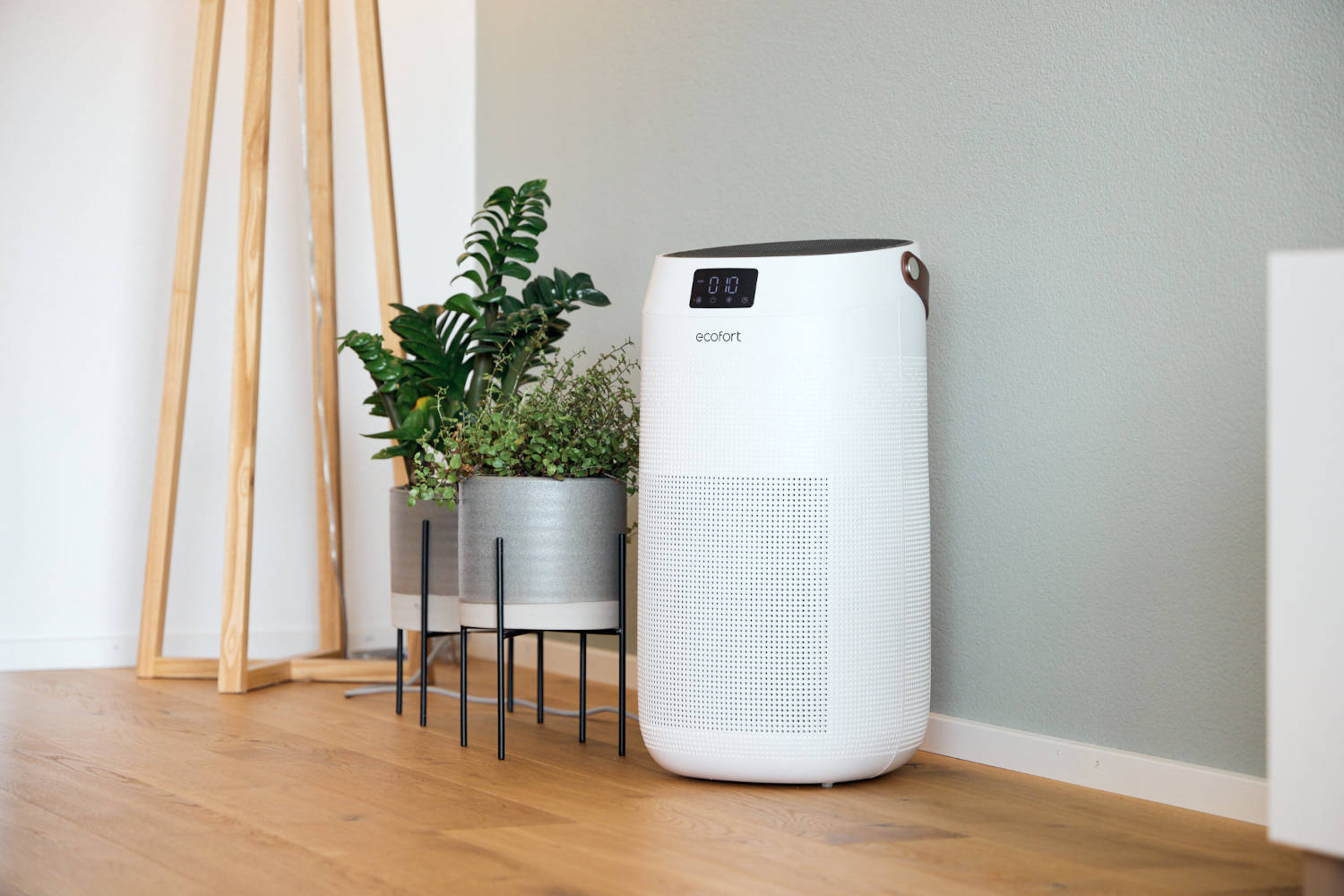 ecoQ CleanAir 400 air purifier in the living room corner